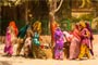 Ladies worshipping holy tree