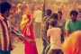 A form of Holi, called 'Latth-Maar', where women with bamboo sticks, chase men