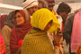 People walk up to the Ganga river for the holy dip.